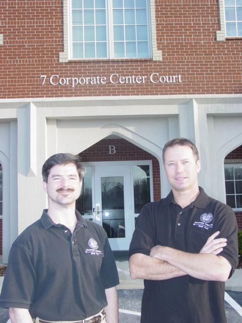 Philip and Brian in front of office